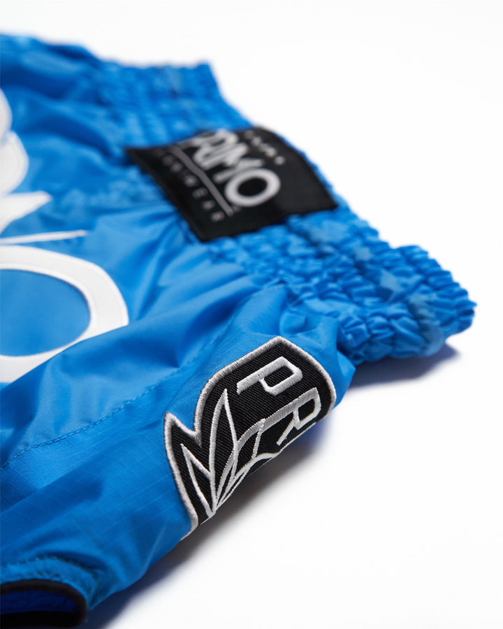 Super-Nylon Muay Thai Shorts - Blue Jay - Primo Tag Closeup